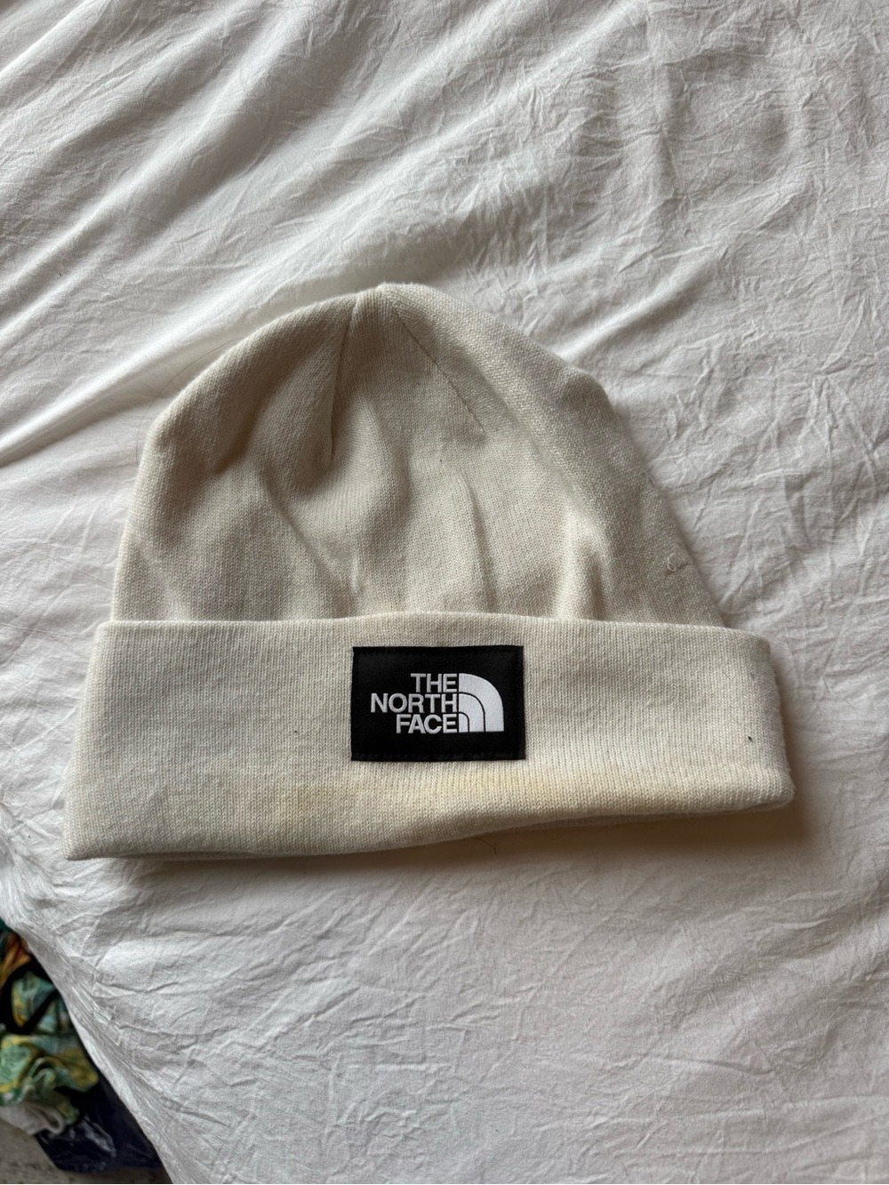 The North Face Ivory Beanie with Black Logo Patch
